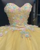 Strapless Pastel Yellow Quinceanera Dress With Blue Flowers