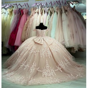 V Neck Rose Gold Quinceanera Dress Lace Appliquéd Ball Gown With Bow